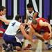 From left, Bedford High School's Bradley Boss, Pioneer High School's Aedan York and Jibreel Hussien reach after Bedford's Adam Swisher during the second quarter at Pioneer on Tuesday, Feb. 19, 2013. Melanie Maxwell I AnnArbor.com